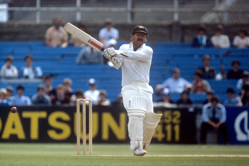 Rod Marsh, batting in a cap, completes a pull shot