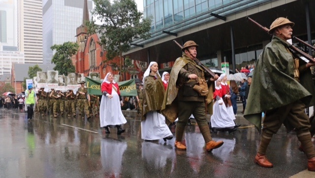 People march in wet conditions in Perth