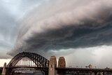 A storm cloud above the Sydney Harbour Bridge
