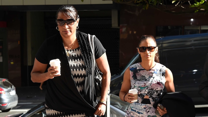 NT Senator Nova Peris (left) and her daughter Jessica Peris arrive at Downing Centre Local Court.