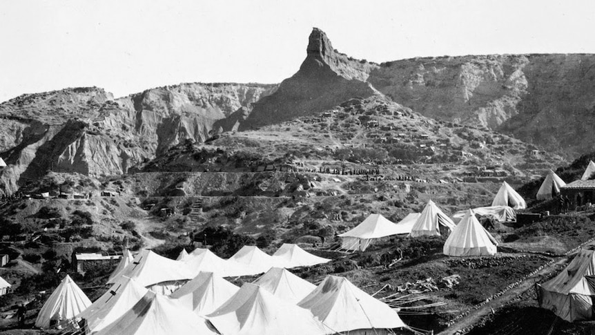 An encampment at Gallipoli in October 1915, with the 'Sphinx' or 'Cathedral' in the background. The front tents were occupied by No. 1 Clearing Hospital.