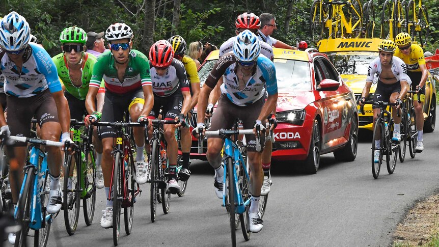 Sky's Mikel Landa (2R) helped teammate Chris Froome regain lost time on stage 15. (Photo: AP/Bernard Papon)