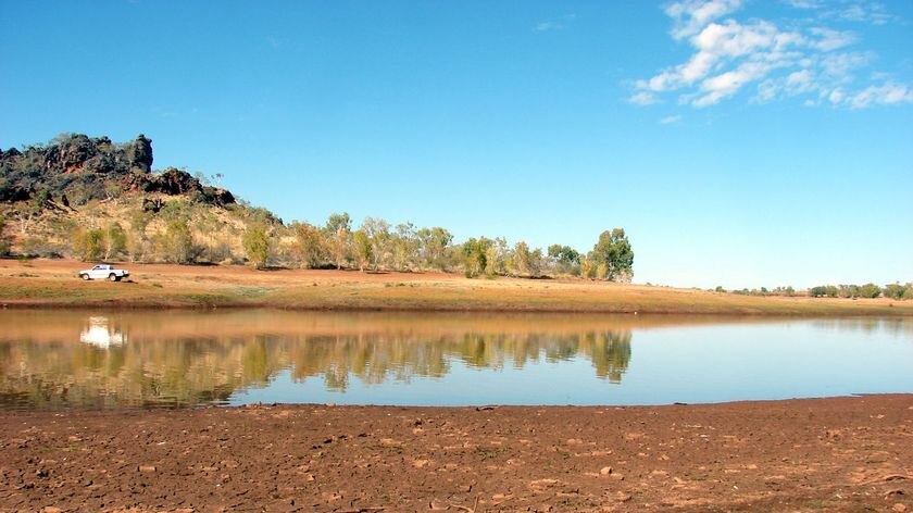 Wide shot of very dry Chinaman Creek Dam, the town dam at Cloncurry in north west Qld