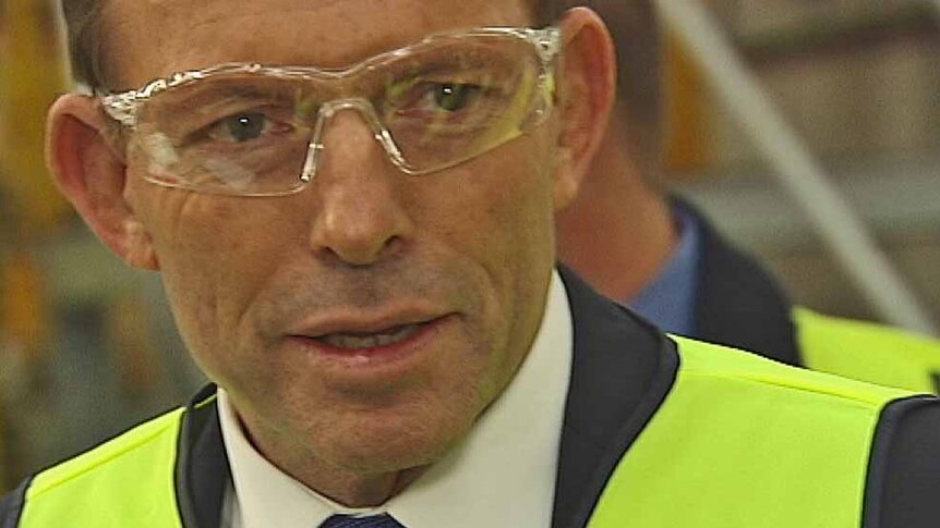 Tony Abbott in safety glasses
