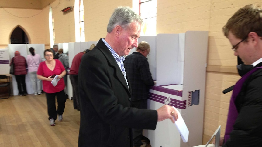 Senator Richard Colbeck voting