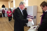 Senator Richard Colbeck voting