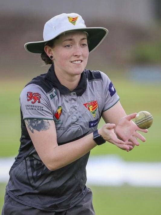 Tasmanian cricketer Emily Smith catches a ball during training.