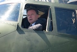 Defence Minister Joel Fitzgibbon at the Point Cook RAAF base with Defence Force personnel