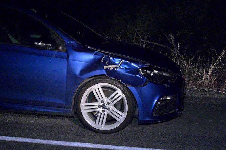 A damaged car.