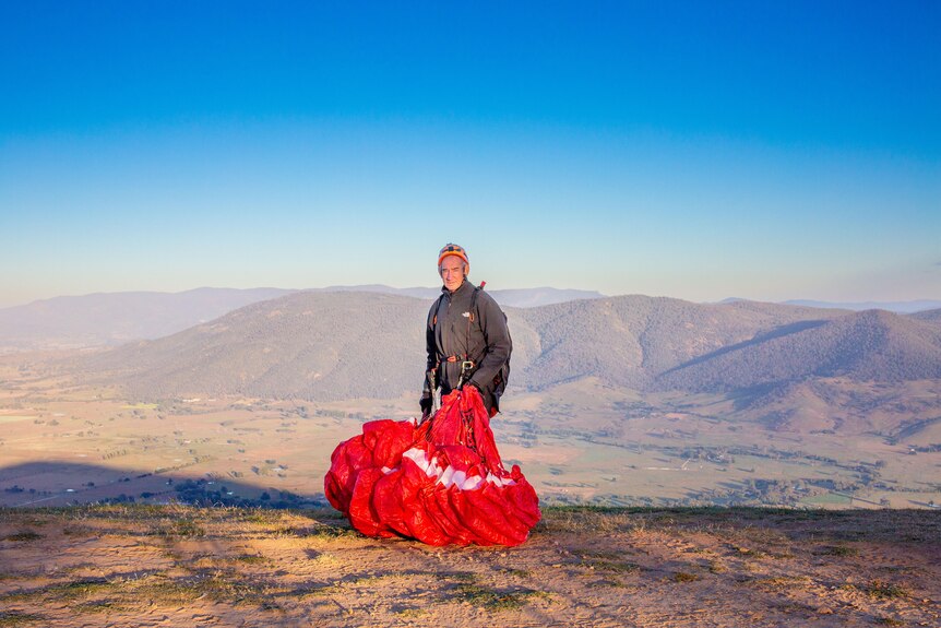Ken Hutt with his paraglider
