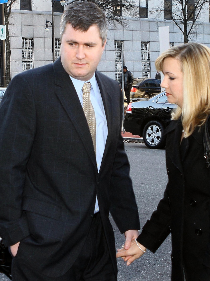 Gabe Watson, along with wife Kim, prepares to enter the Mel Bailey Criminal Justice Centre.