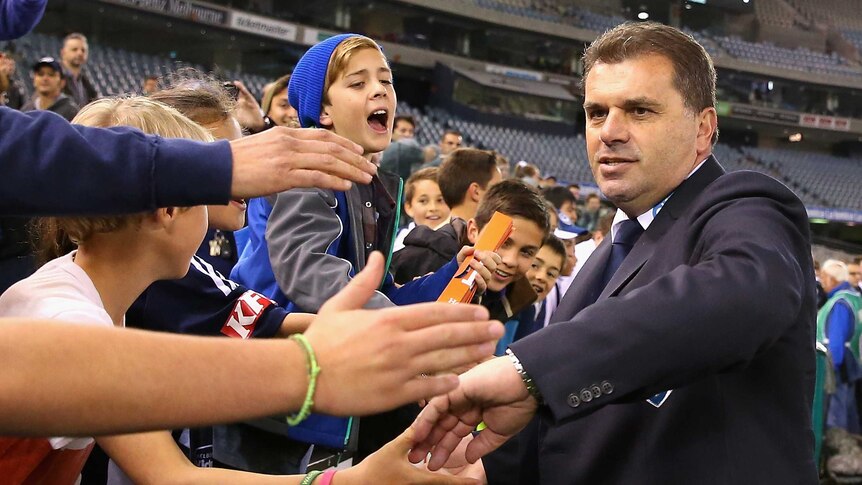 Pressing the flesh ... Ange Postecoglou says goodbye to Victory fans