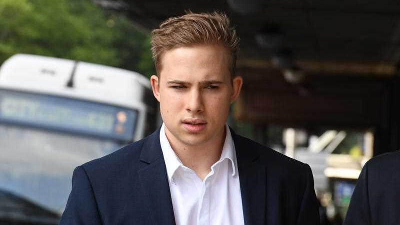 A man in a suit heading to court.