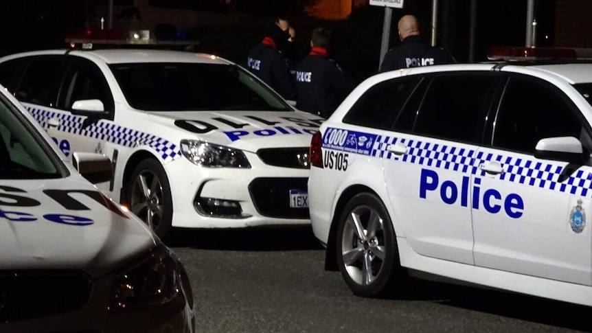 Three police cars parked outside Banksia Hill juvenile detention centre