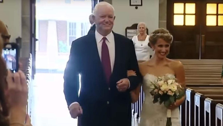 Bride walks down the aisle