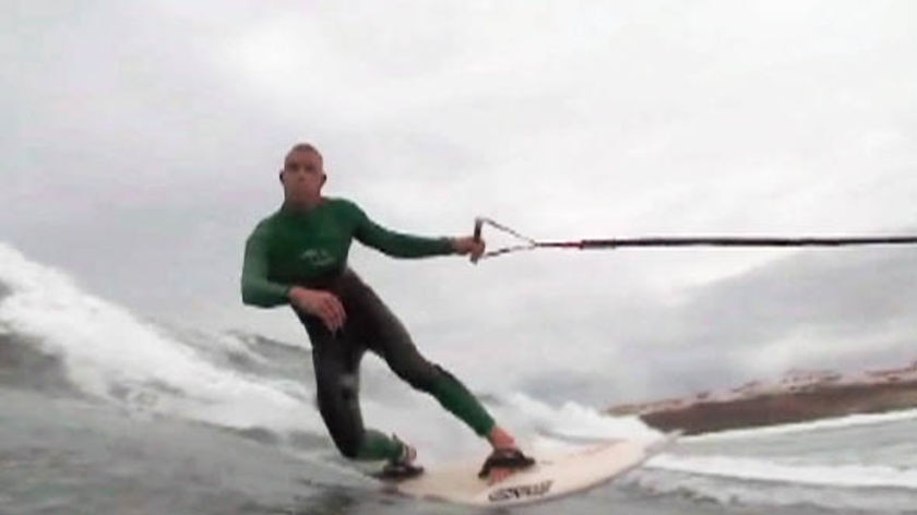 TV still: Close up of Mick Fanning surfing in Portugal