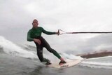 TV still: Close up of Mick Fanning surfing in Portugal