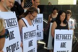The group stripped to their underwear and have started marching back to Julie Bishop's office from the Perth Magistrates Court.