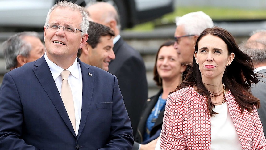 Scott Morrison stands next to Jacinda Ardern