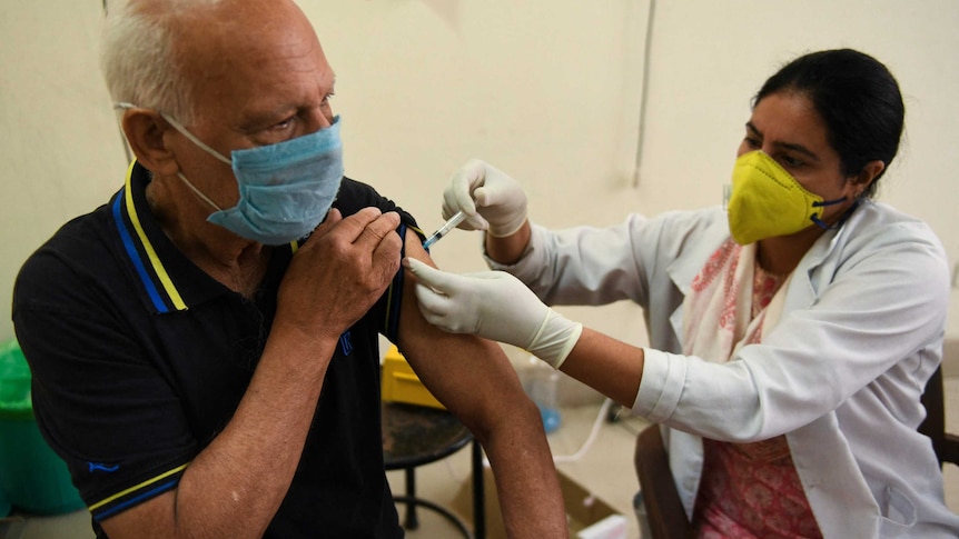 Man getting his COVID-19 vaccine