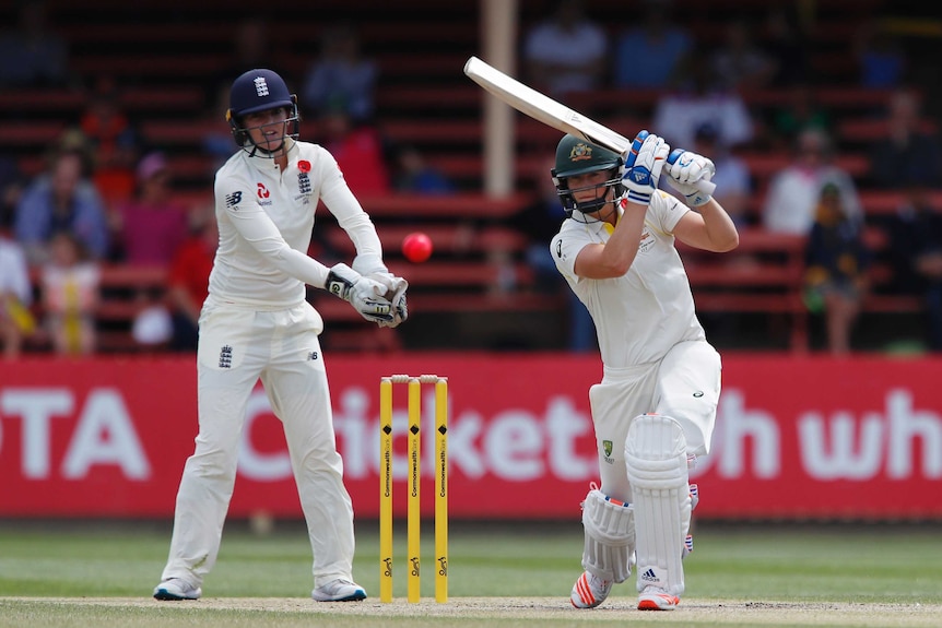 Ellyse Perry hits to the on-side against England in the Women's Ashes Test at North Sydney Oval.