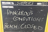Beach closed sign at Surfers Paradise on February 11, 2017