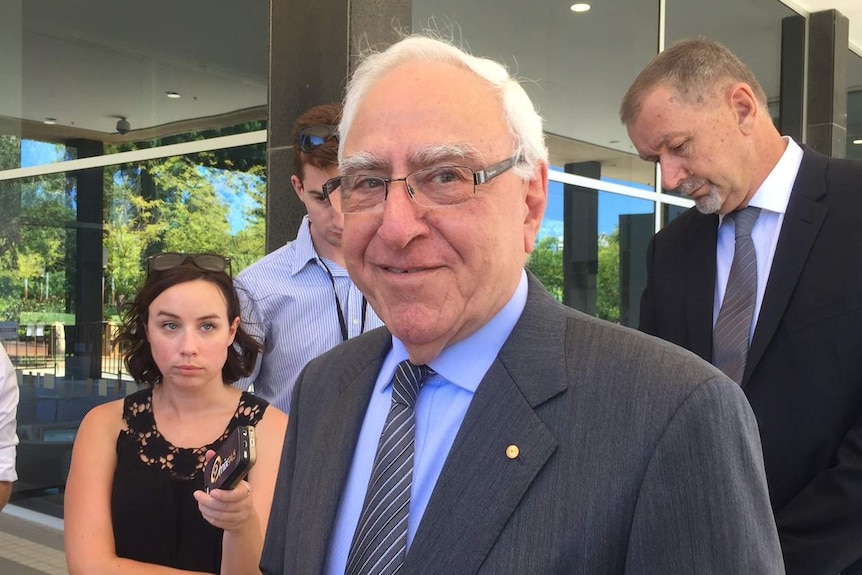 Former Governor Ken Michael at a press conference in Perth.