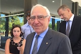 Former Governor Ken Michael at a press conference in Perth.