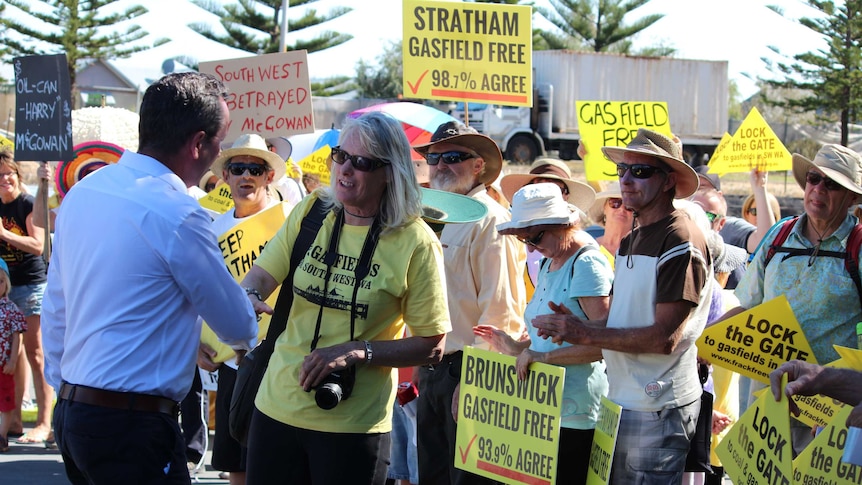 WA Premier Mark McGowan greets protestors