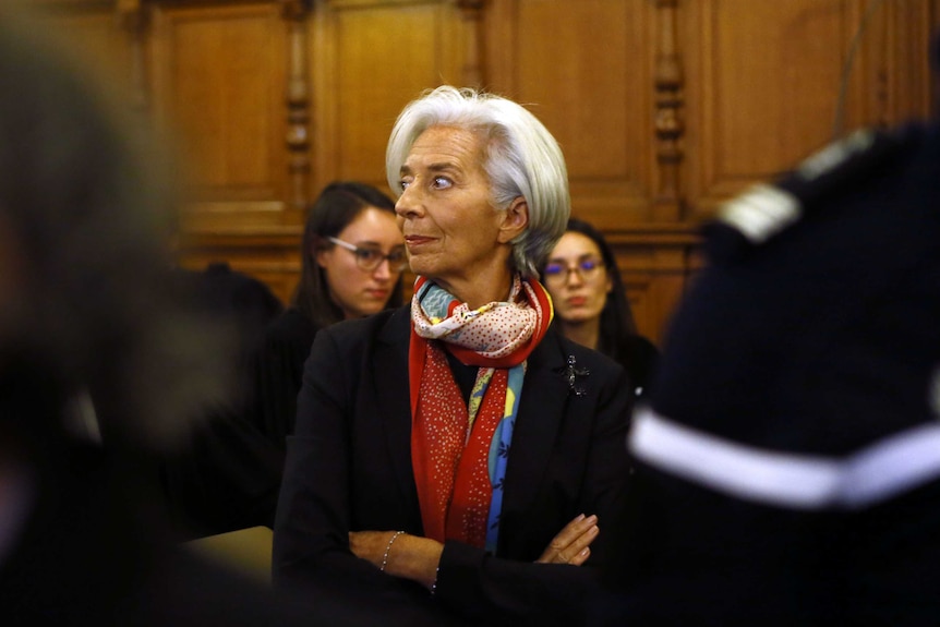 International Monetary Fund chief Christine Lagarde waits at a special court
