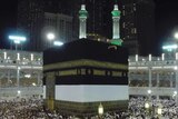 Muslim pilgrims pray around the holy Kaaba in Mecca