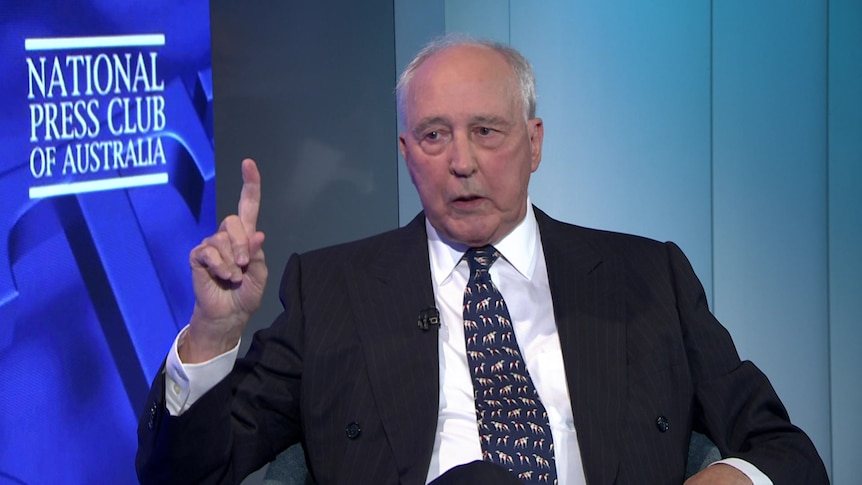 Paul Keating holds one finger up while speaking at the national press club