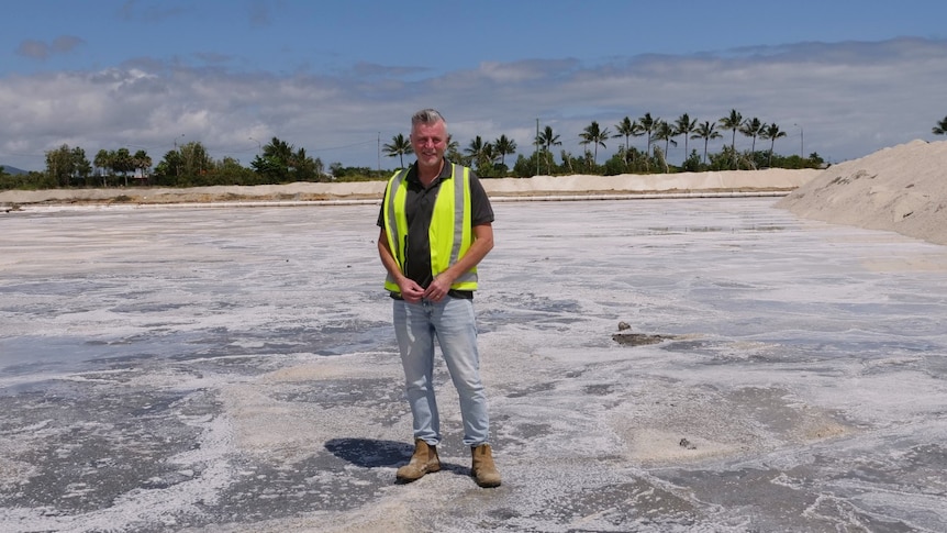 Michael McNamara stands on the salt fields at Australia's most northern salt operation, based in Bowen