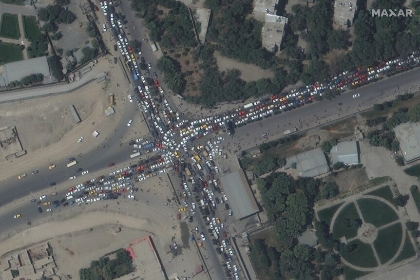 An aerial shot of cars at an intersection in Kabul.