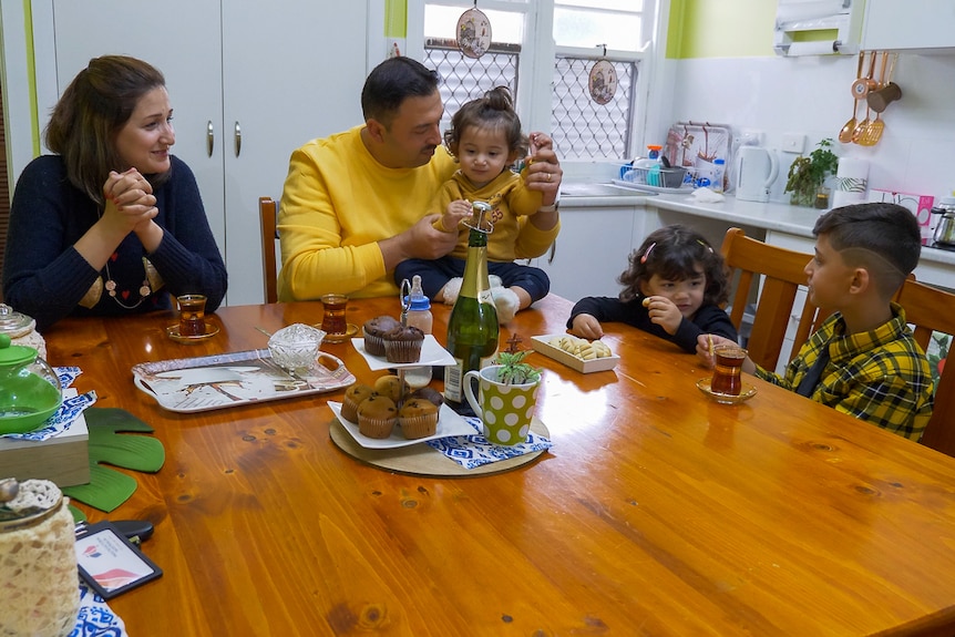 Jankey Joweesh and his family in their kitchen in Toowoomba, July 2020.