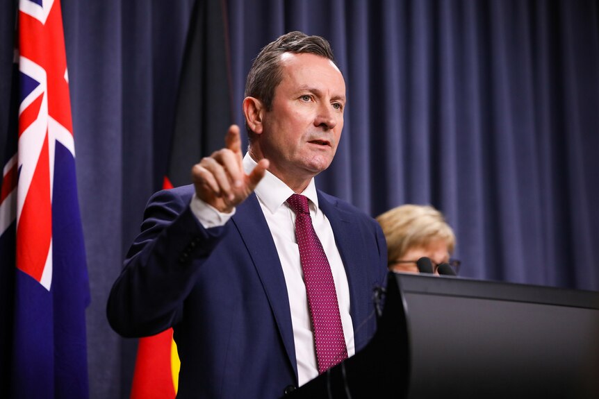 Mark McGowan pointing at a press conference.