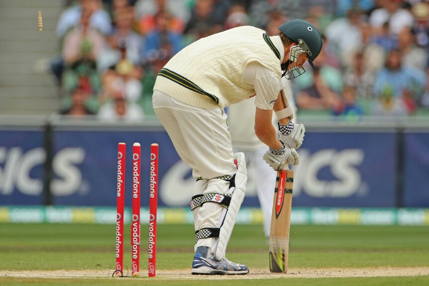 Cleaned up ... Jackson Bird leaves Mitchell Johnson stranded on 92 after losing his stumps to Shaminda Eranga.