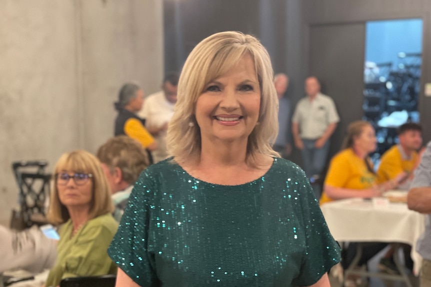 nationals candidate kim okeeffe smiles at camera on election night 22