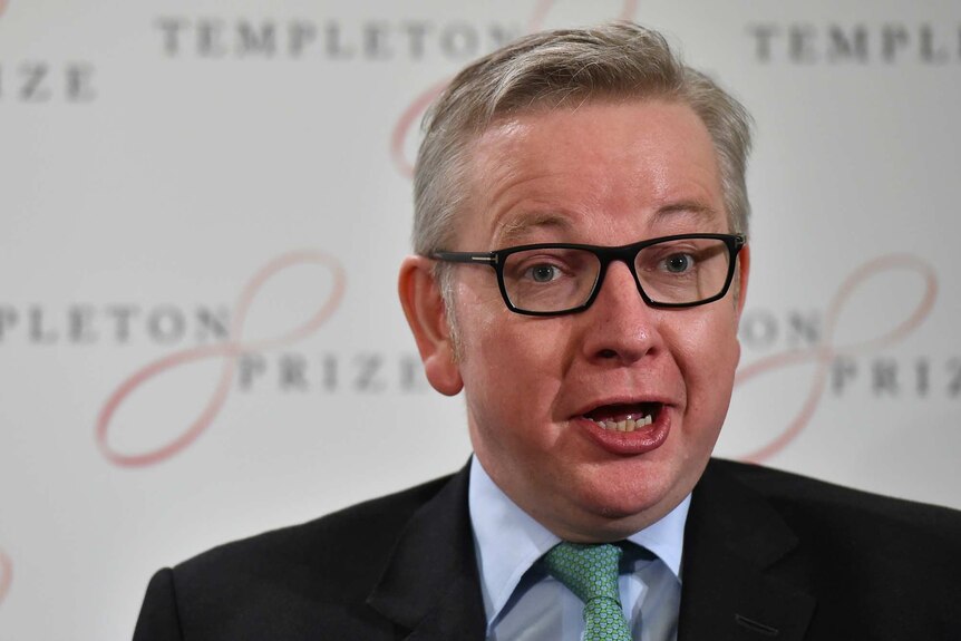 Michael Gove speaking at a press conference.