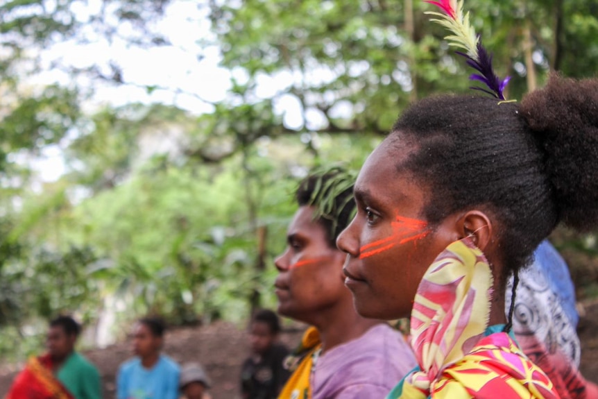 People in traditional dress gather in the village of Loutaliko, on Tanna in Vanuatu.