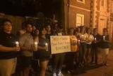 Protesters gather outside Jared Kushner and Ivanka Trump's home in Washington DC for a candlelight vigil.