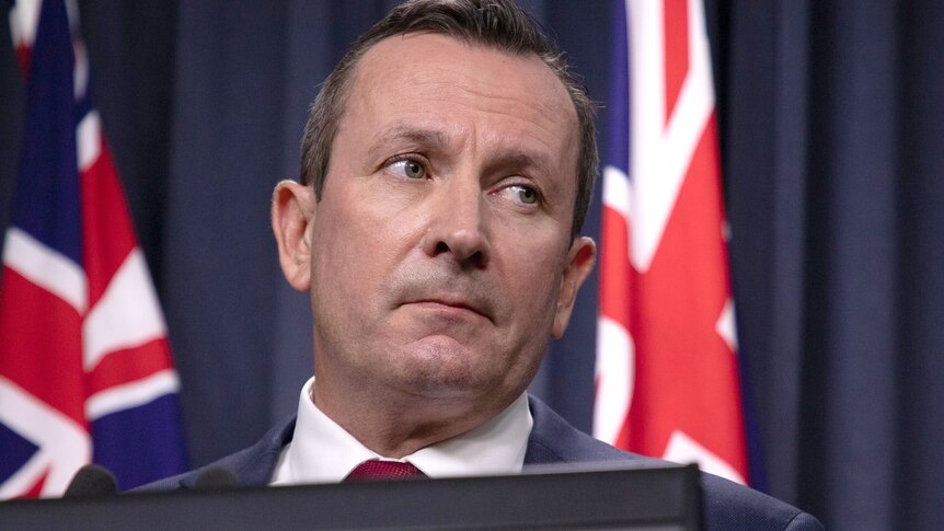 A tight head shot of Mark McGowan looking to his left.