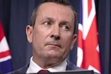 A tight head shot of Mark McGowan looking to his left.