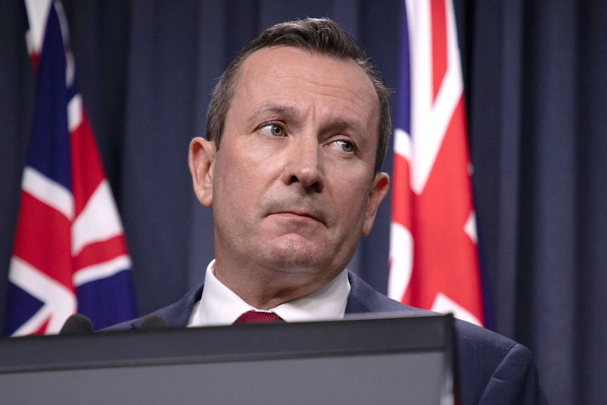 A tight head shot of Mark McGowan looking to his left.