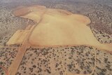 A drone image above a proposed mining project in the outback.  