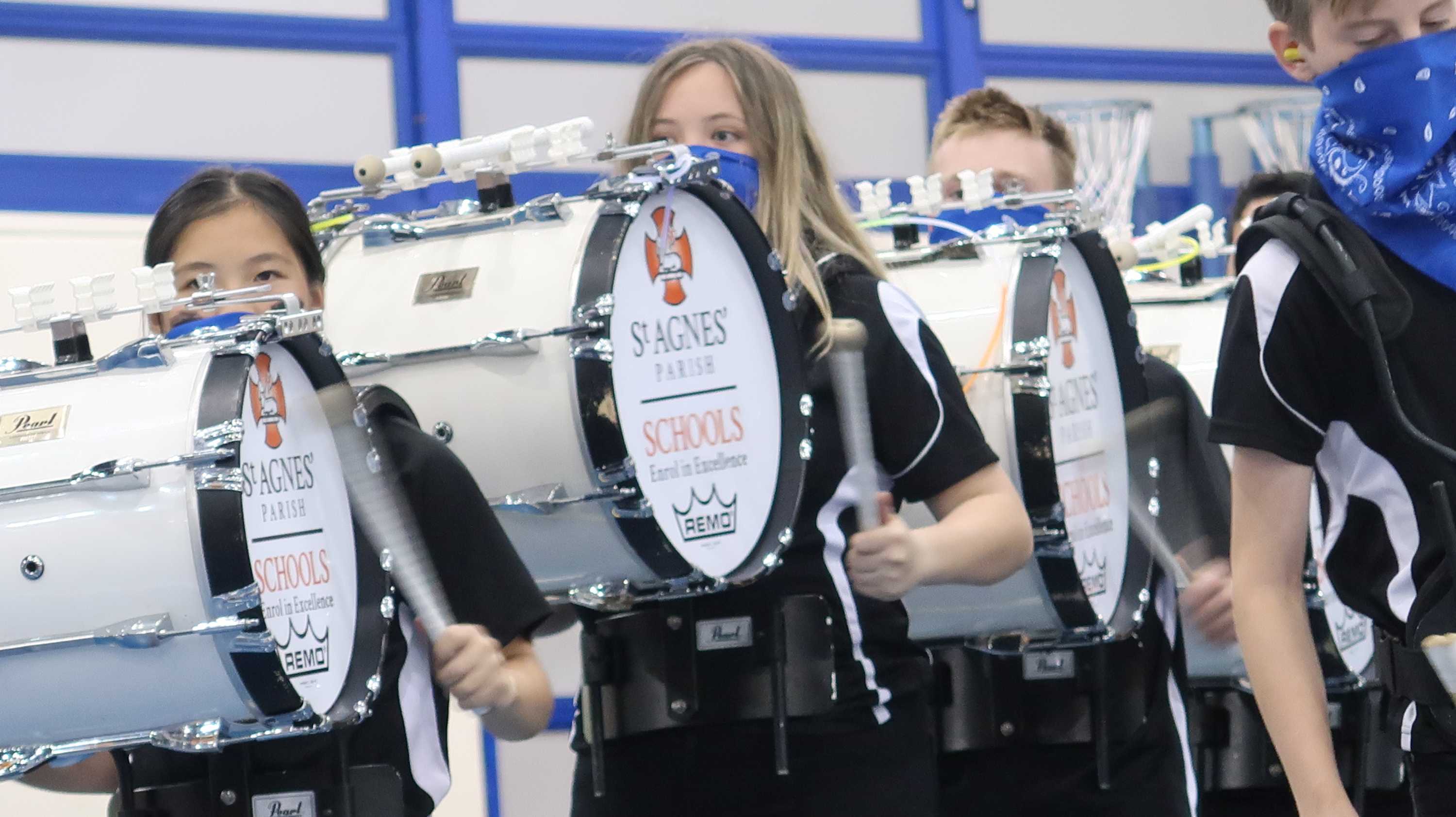 Drumlines teach young marching percussion bands the value of teamwork