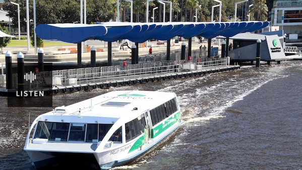A ferry pulls out of Elizabeth Quay terminal. Has Audio.