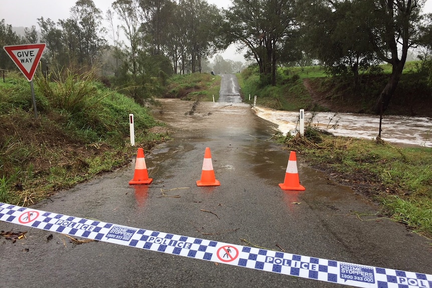 Police tape at flooded causeway where a car was swept away near Gympie on evening of October 16, 2017