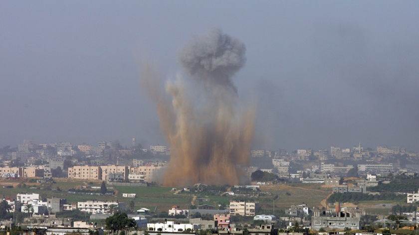 Smoke billows from a targeted location inside the northern Gaza Strip.