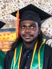 File photo of Ezekiel Narndu in graduation clothes